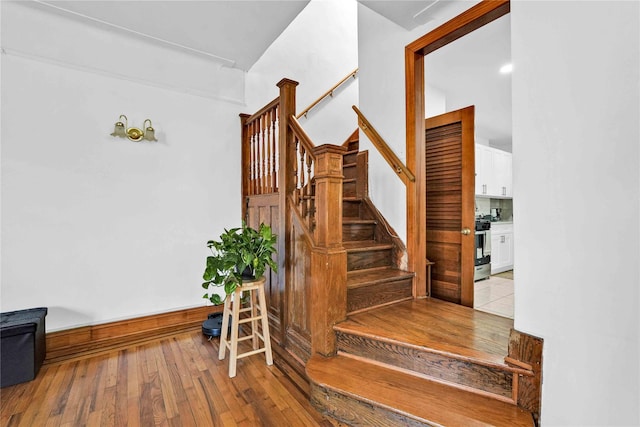 113-23 204th St, Saint Albans, NY 11412 - staircase with hardwood / wood-style flooring