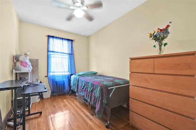 113-23 204th St, Saint Albans, NY 11412 - bedroom with wood finished floors and ceiling fan