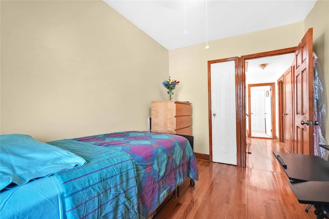 113-23 204th St, Saint Albans, NY 11412 - bedroom featuring light wood-style flooring and baseboards