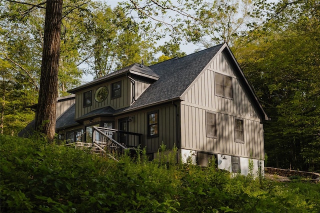 258 Fox Run Rd, Salt Point, NY 12578 - view of property exterior with a shingled roof and board and batten siding