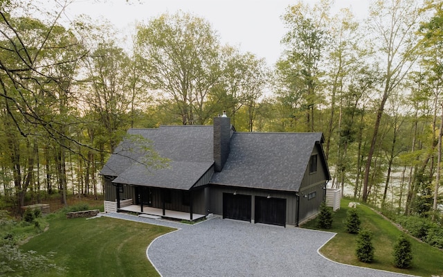 258 Fox Run Rd, Salt Point, NY 12578 - view of front of property with driveway, roof with shingles, a front yard, and a chimney