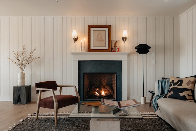 258 Fox Run Rd, Salt Point, NY 12578 - living area featuring wood finished floors and a lit fireplace