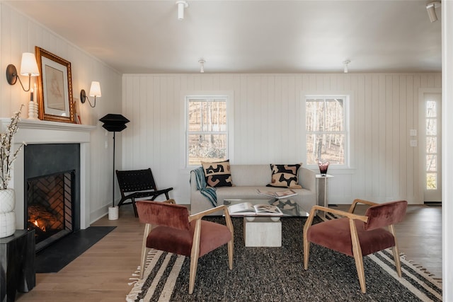 258 Fox Run Rd, Salt Point, NY 12578 - living room with a fireplace with flush hearth, wood finished floors, crown molding, and baseboards