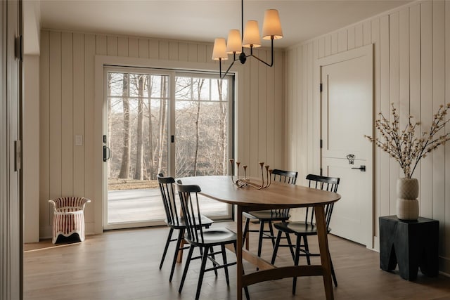 258 Fox Run Rd, Salt Point, NY 12578 - dining space with light wood finished floors and wooden walls