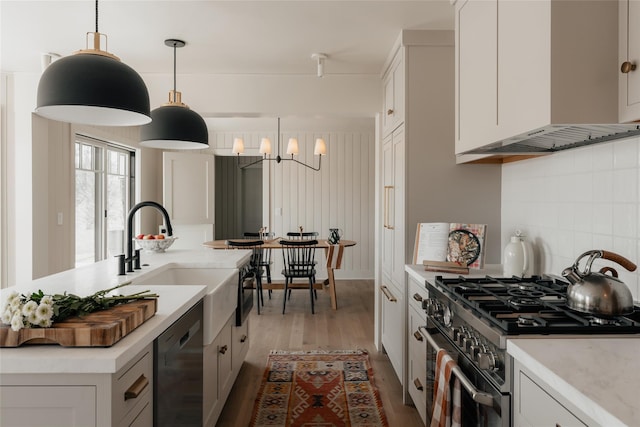 258 Fox Run Rd, Salt Point, NY 12578 - kitchen featuring gas stove, dishwasher, range hood, light wood-type flooring, and white cabinetry