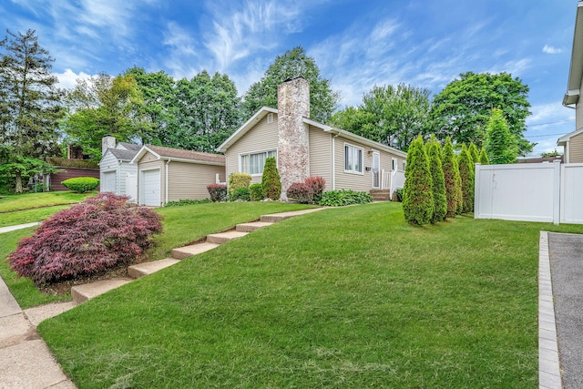 5 Willets Dr, Syosset, NY 11791 - view of front of home featuring an outbuilding and a chimney