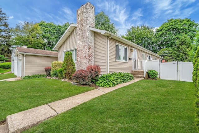 5 Willets Dr, Syosset, NY 11791 - view of front of home with a chimney, an outdoor structure, a gate, and an attached garage