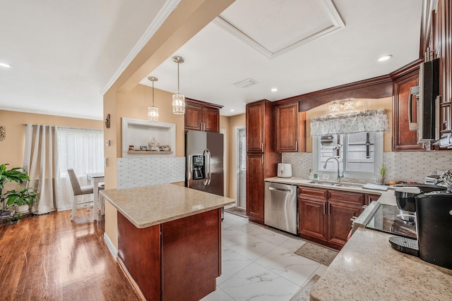 5 Willets Dr, Syosset, NY 11791 - kitchen with stainless steel appliances, a kitchen island, decorative backsplash, a sink, and recessed lighting