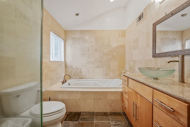 5 Willets Dr, Syosset, NY 11791 - bathroom with tile walls, toilet, vanity, a garden tub, and lofted ceiling