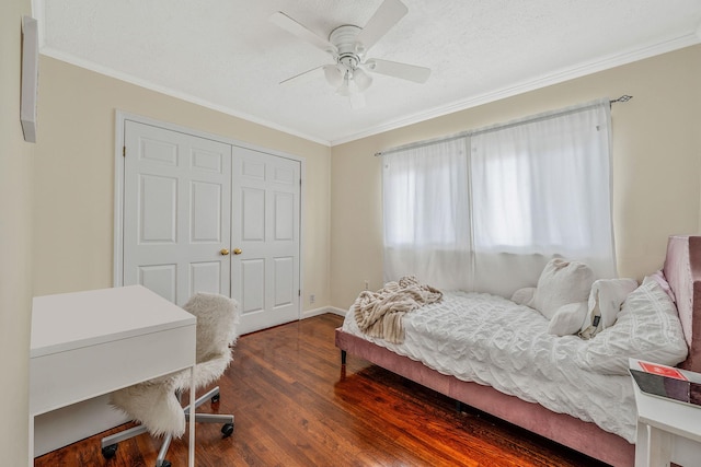 5 Willets Dr, Syosset, NY 11791 - bedroom featuring crown molding, dark wood finished floors, a closet, and ceiling fan