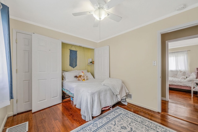 5 Willets Dr, Syosset, NY 11791 - bedroom with wood finished floors, ornamental molding, baseboards, and ceiling fan