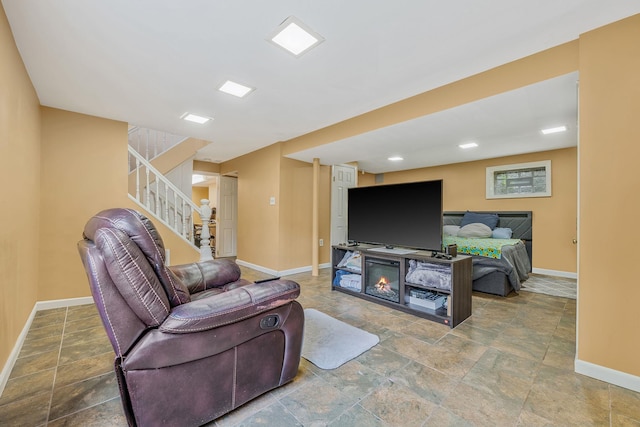 5 Willets Dr, Syosset, NY 11791 - living area featuring baseboards, stone finish floors, and stairway