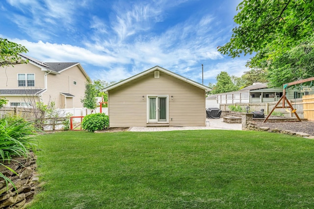 5 Willets Dr, Syosset, NY 11791 - back of property featuring a patio, french doors, and a playground