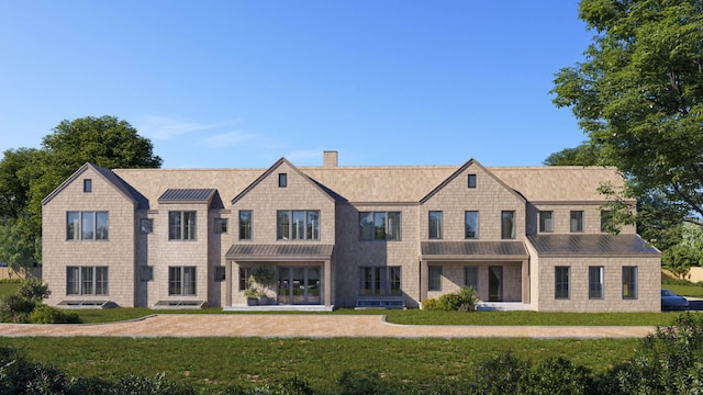 150 Edge Of Woods Rd, Southampton, NY 11968 - view of front facade featuring a chimney and a front lawn