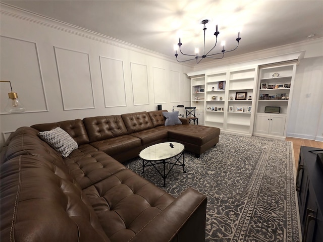 117-01 Park Ln S Unit A3C, Kew Gardens, NY 11415 - living room featuring a chandelier, ornamental molding, a decorative wall, light wood-style flooring, and built in shelves