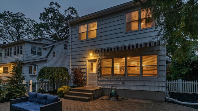 110 Driscoll Ave, Rockville Centre, NY 11570 - rear view of house featuring an outdoor living space