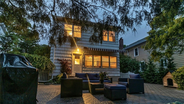110 Driscoll Ave, Rockville Centre, NY 11570 - back of house with outdoor lounge area and a patio