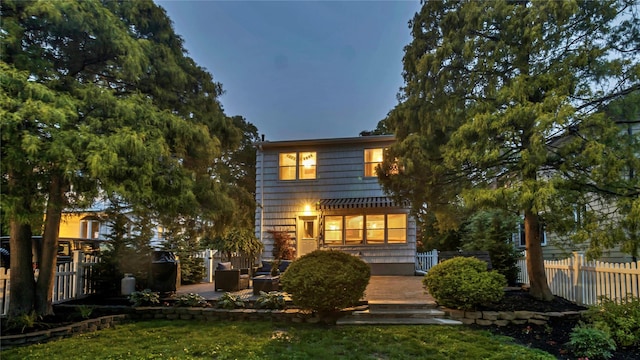 110 Driscoll Ave, Rockville Centre, NY 11570 - rear view of house featuring a patio
