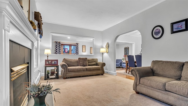 110 Driscoll Ave, Rockville Centre, NY 11570 - carpeted living area with arched walkways and baseboards