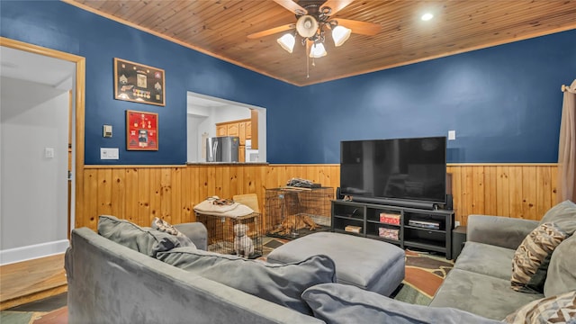 110 Driscoll Ave, Rockville Centre, NY 11570 - living area featuring a wainscoted wall, wood walls, ceiling fan, wood ceiling, and wood finished floors