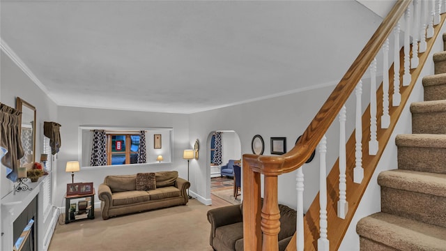 110 Driscoll Ave, Rockville Centre, NY 11570 - carpeted living room with stairs and crown molding