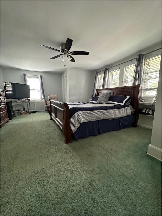 110 Driscoll Ave, Rockville Centre, NY 11570 - bedroom with carpet and a ceiling fan