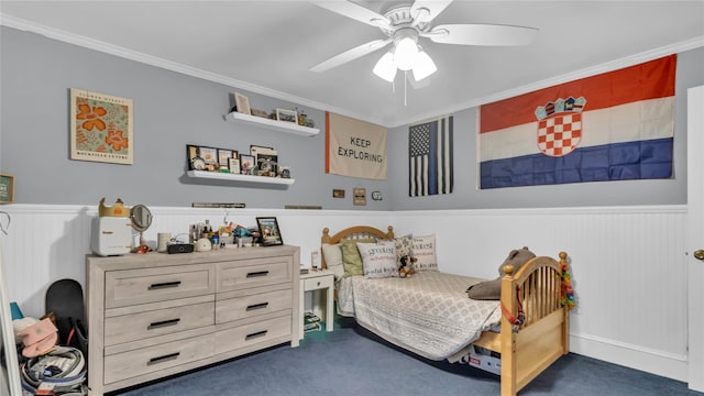 110 Driscoll Ave, Rockville Centre, NY 11570 - bedroom with dark carpet, wainscoting, ornamental molding, and a ceiling fan