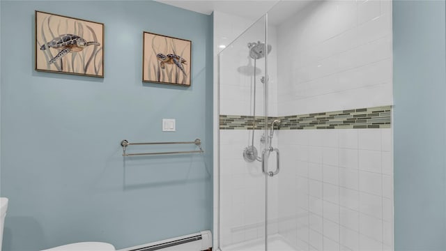 110 Driscoll Ave, Rockville Centre, NY 11570 - full bath with a shower stall, a baseboard heating unit, and toilet