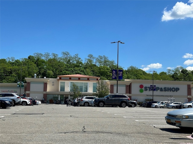 13 Linwood Rd S, Port Washington, NY 11050 - view of commercial property featuring uncovered parking