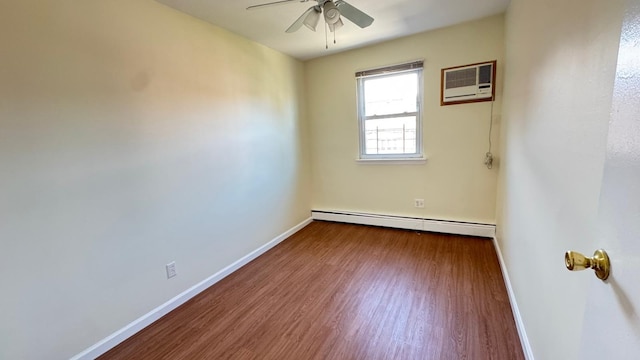 15307 79th Ave, Flushing, NY 11367 - empty room with a wall mounted AC, a baseboard radiator, wood finished floors, baseboards, and ceiling fan