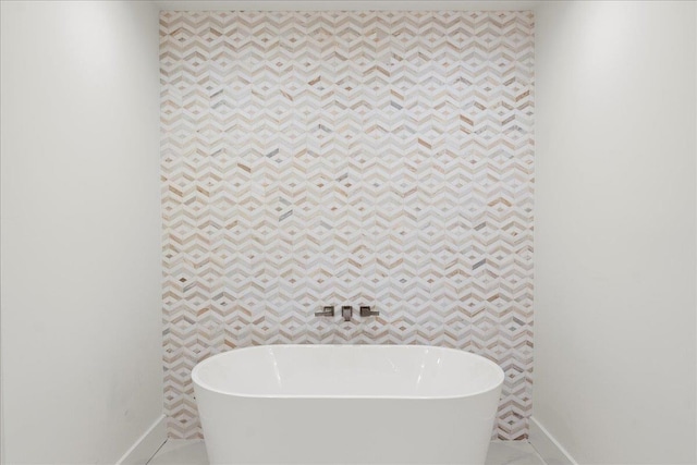14 Kennedy Ln, West Islip, NY 11795 - full bath with a freestanding bath and baseboards