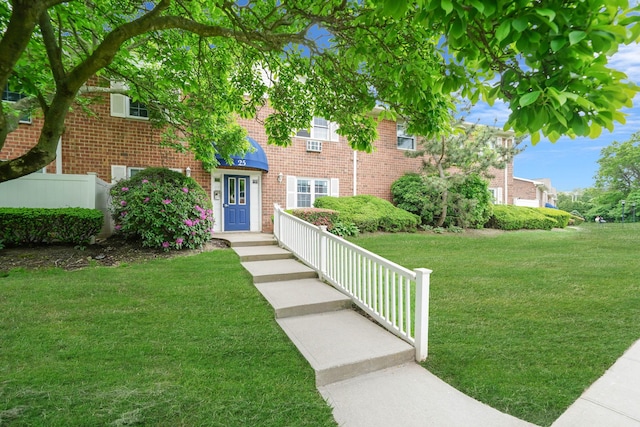 460 Old Town Rd Unit 25N, Port Jefferson Station, NY 11776 - view of front of property with a front yard and brick siding