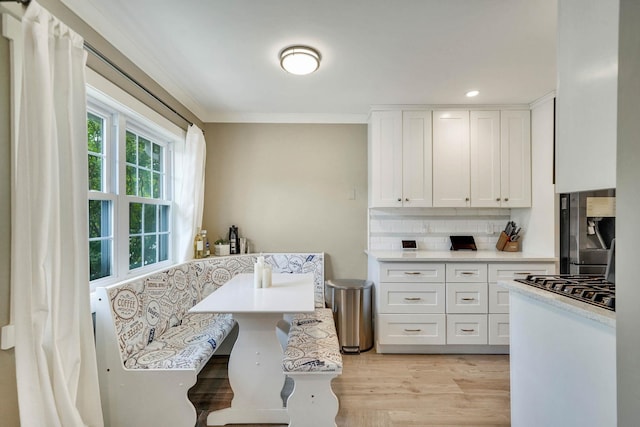 460 Old Town Rd Unit 25N, Port Jefferson Station, NY 11776 - washroom with light wood finished floors, crown molding, and recessed lighting