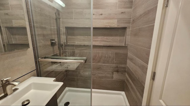 460 Old Town Rd Unit 25N, Port Jefferson Station, NY 11776 - bathroom featuring a stall shower and a sink