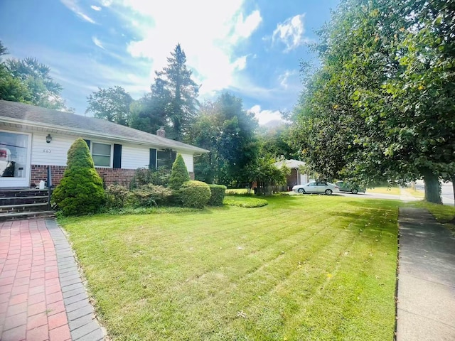 663 Woodbury Rd, Oyster Bay, NY 11791 - view of green lawn