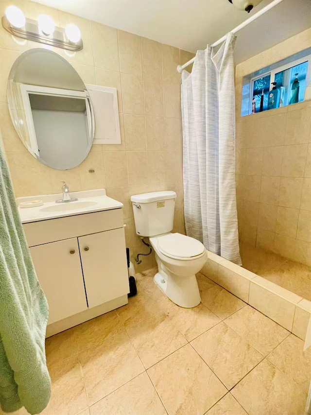 663 Woodbury Rd, Oyster Bay, NY 11791 - full bathroom with toilet, vanity, a shower stall, and tile patterned floors