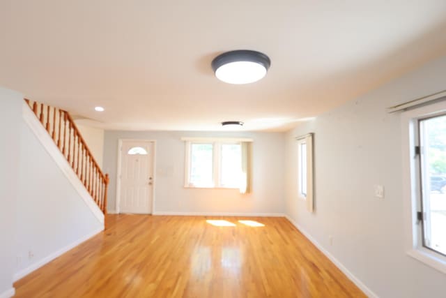 22-23 147th St, Whitestone, NY 11357 - entryway with stairway, light wood-style floors, plenty of natural light, and recessed lighting