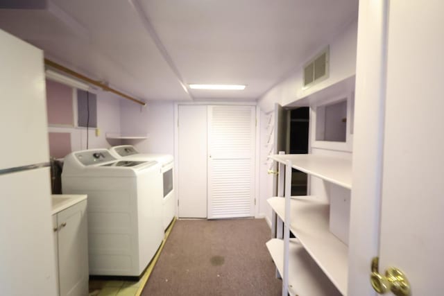 22-23 147th St, Whitestone, NY 11357 - laundry area featuring washer and dryer and light colored carpet