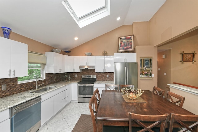 6 Country Ct, Farmingdale, NY 11735 - kitchen with appliances with stainless steel finishes, under cabinet range hood, a sink, tasteful backsplash, and light tile patterned flooring