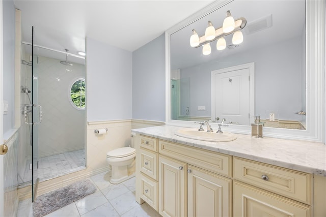 47 Valley Rd, Old Westbury, NY 11568 - full bathroom featuring a stall shower, toilet, vanity, tile walls, and a wainscoted wall