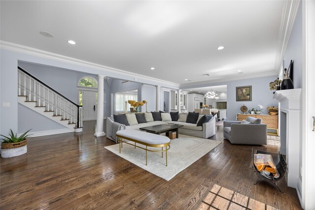 47 Valley Rd, Old Westbury, NY 11568 - living room with crown molding, ornate columns, dark wood-style floors, recessed lighting, and stairway