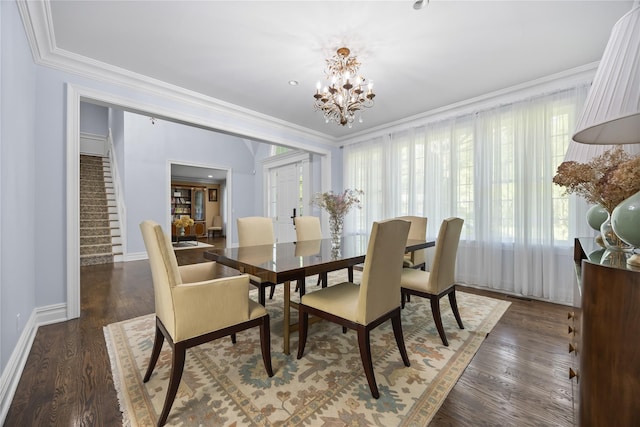 47 Valley Rd, Old Westbury, NY 11568 - dining area featuring stairs, a chandelier, ornamental molding, wood finished floors, and baseboards