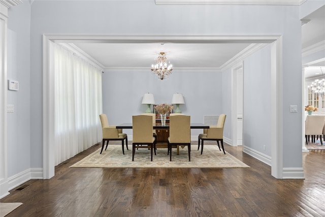 47 Valley Rd, Old Westbury, NY 11568 - dining area with a chandelier, dark wood-style flooring, ornamental molding, and baseboards