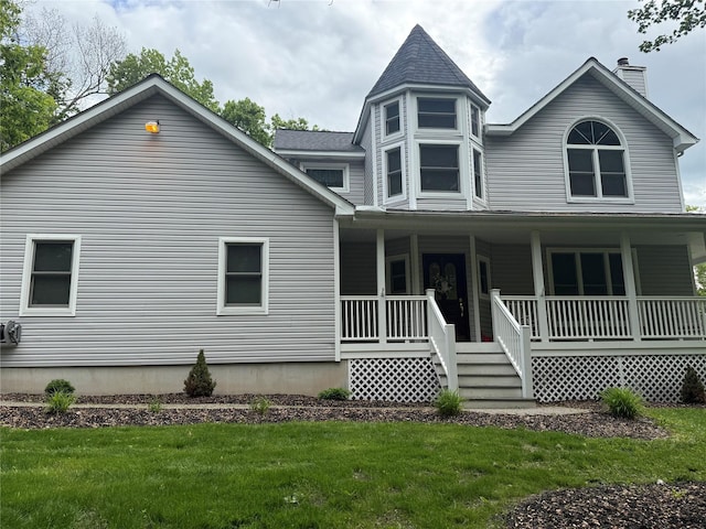 12 Rosell Ct, Lagrangeville, NY 12540 - view of front of property with a porch, a chimney, and a front lawn