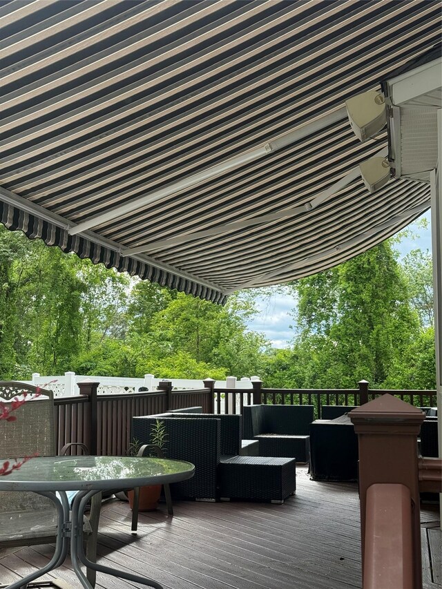 12 Rosell Ct, Lagrangeville, NY 12540 - wooden terrace featuring outdoor dining area, an outdoor hangout area, and view of scattered trees
