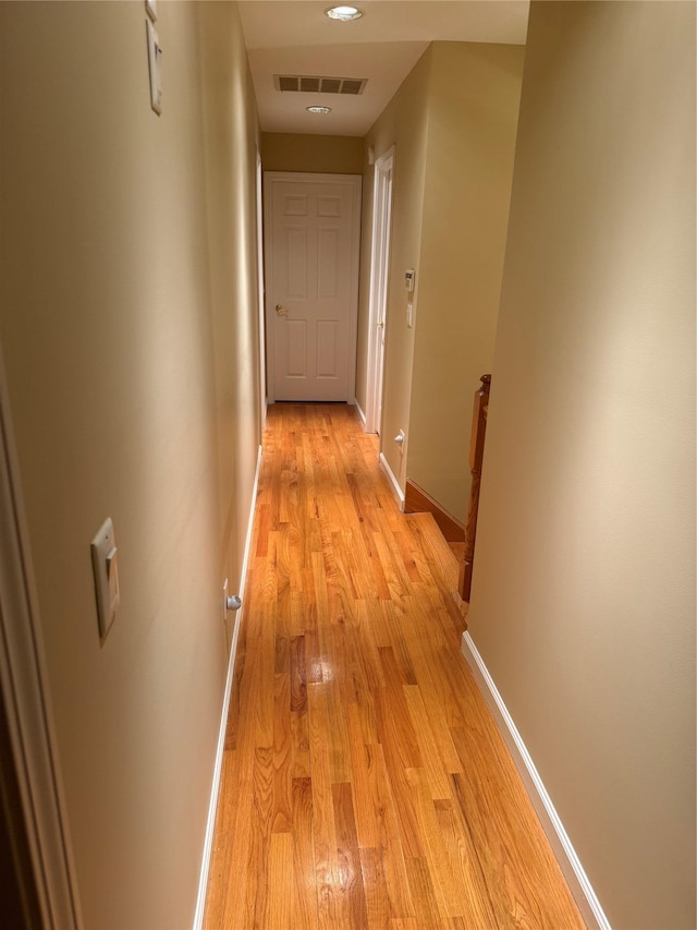12 Rosell Ct, Lagrangeville, NY 12540 - corridor featuring light wood-type flooring, an upstairs landing, and baseboards