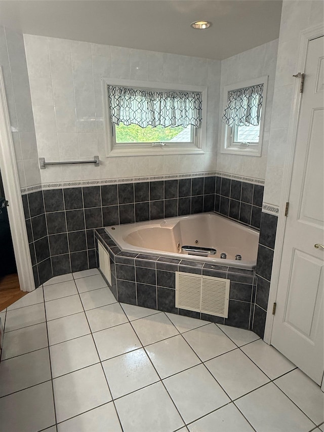 12 Rosell Ct, Lagrangeville, NY 12540 - full bathroom with a whirlpool tub, tile patterned floors, and tile walls