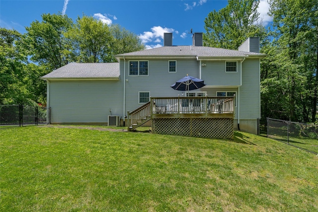10 Wyche Way, Ossining, NY 10562 - rear view of property featuring a wooden deck, a chimney, central AC unit, and stairway