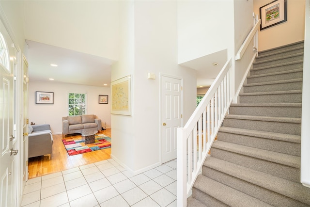 10 Wyche Way, Ossining, NY 10562 - staircase with tile patterned floors, a high ceiling, recessed lighting, and baseboards