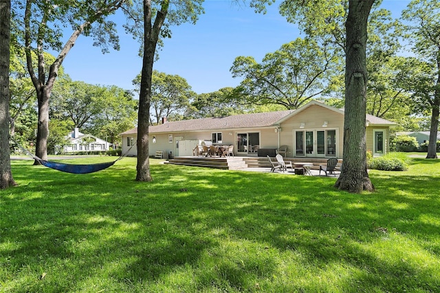 2360 Marlene Ln, Mattituck, NY 11952 - rear view of house with french doors, a wooden deck, a yard, and a patio area